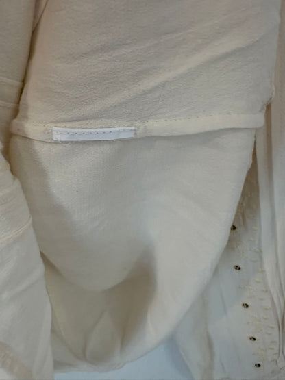 INTROPIA. Blusa beige fluida bordados