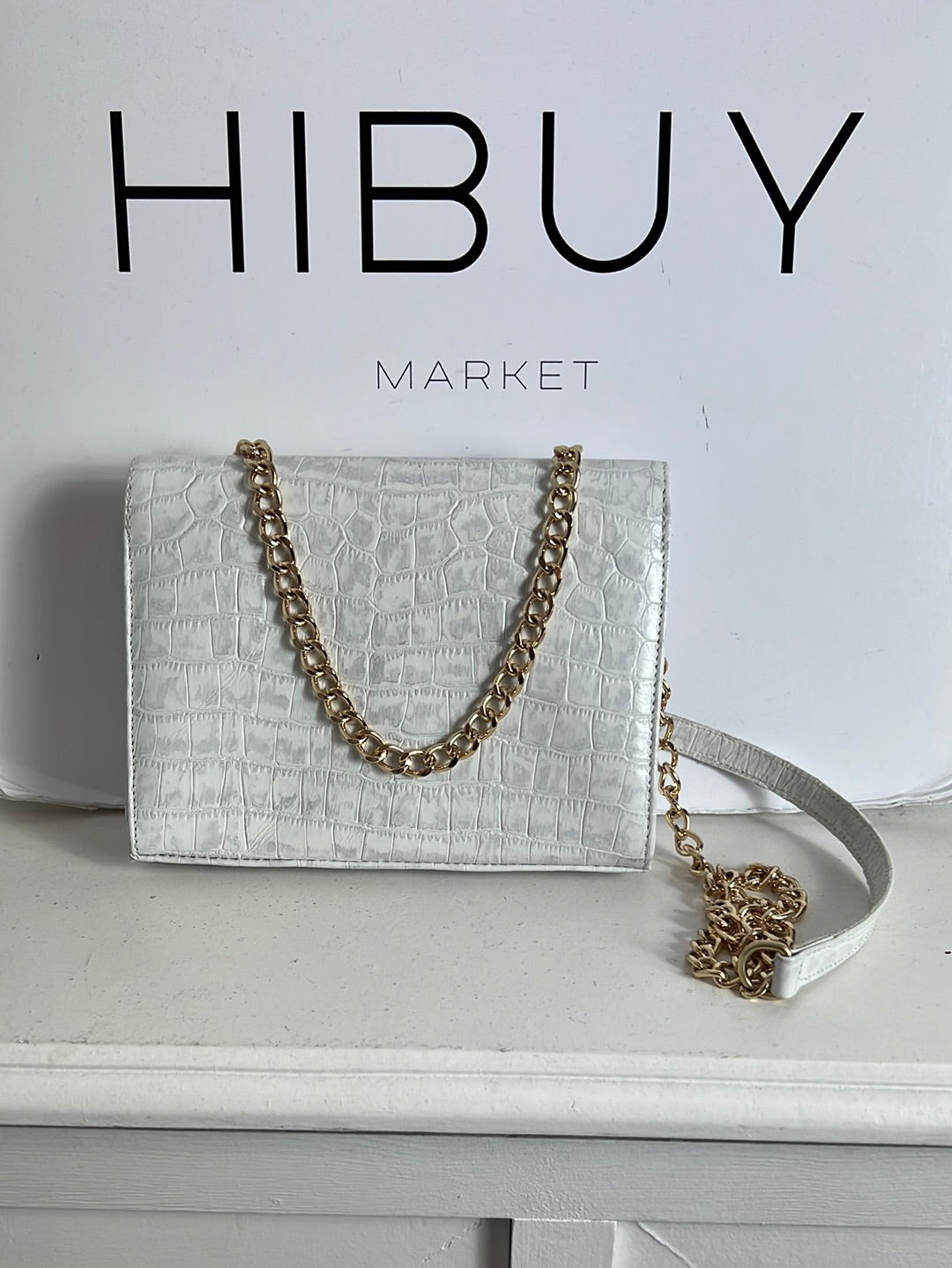 CUPLÉ. Bolso mini piel troquelado