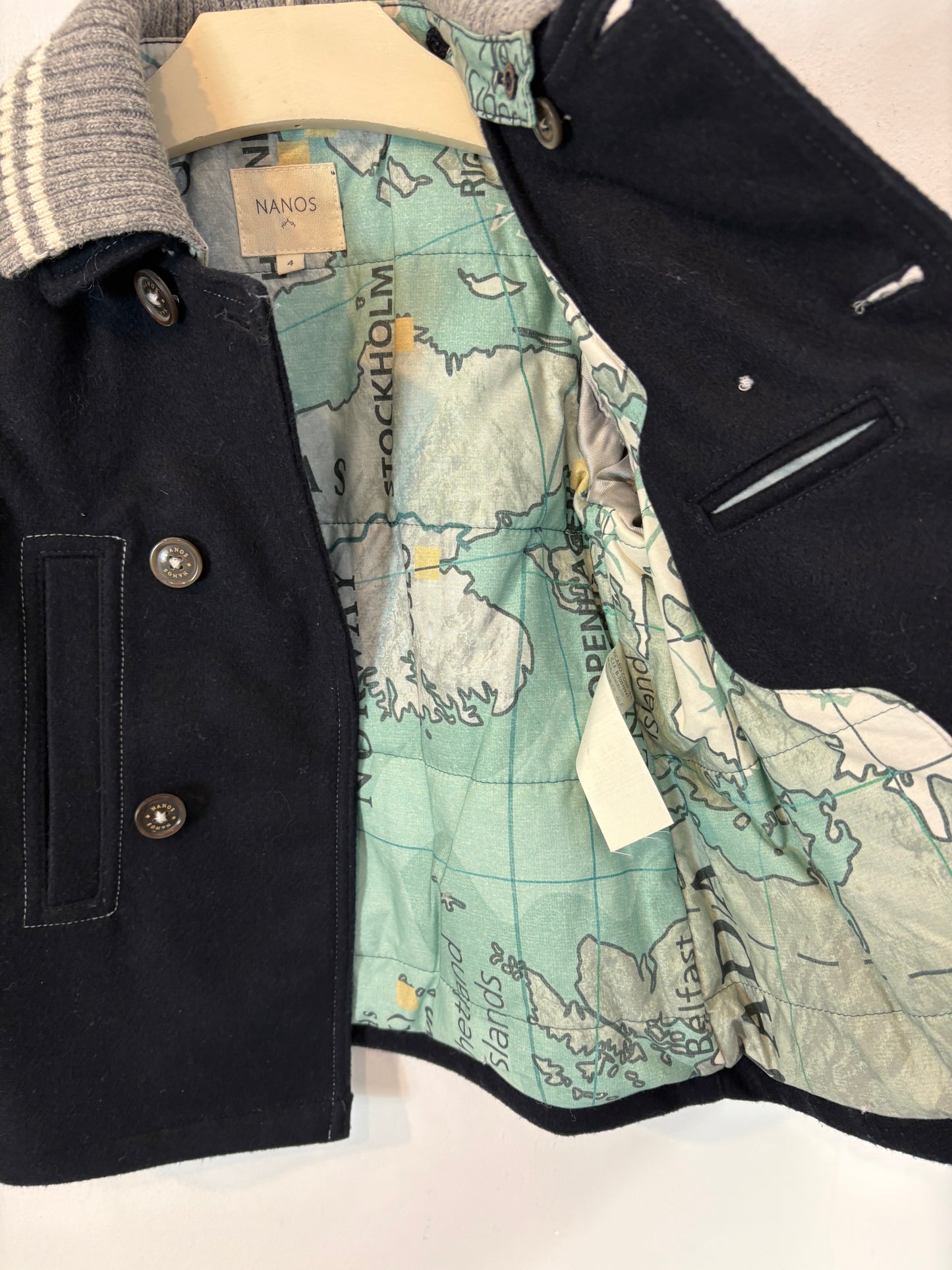 NANOS. Abrigo azul con lana