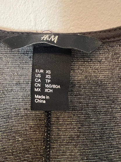 H&M. Chaqueta larga fluida hilos brillo. T XS