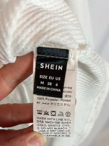 SHEIN. Top blanco textura manga larga. T M