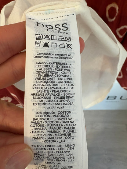 INTROPIA. Conjunto chaleco y falda detalles