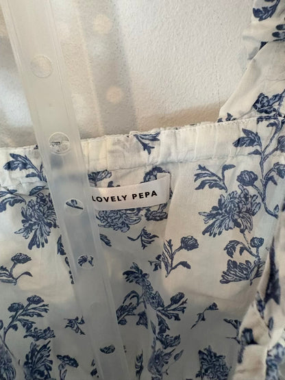 LOVELY PEPA. Conjunto top y falda estampado