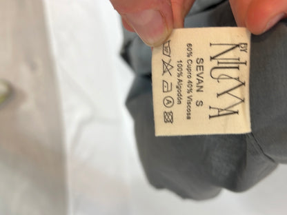 BY NIUMA. Gray textured dress with openings. T.S.