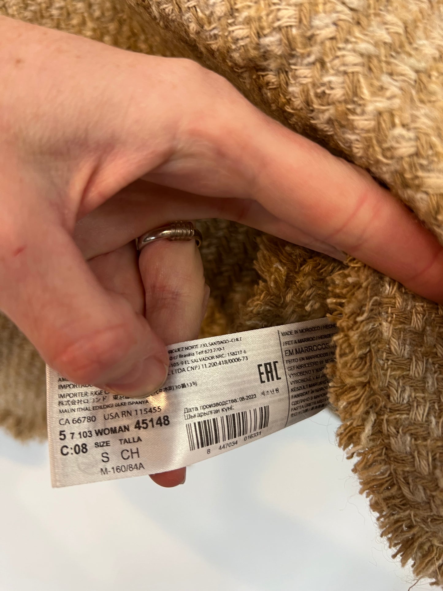 MANGO. Chaqueta tweed botones joya