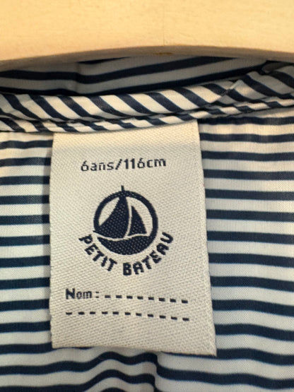PETIT BATEAU. Chaleco azul acolchado. T 6 años