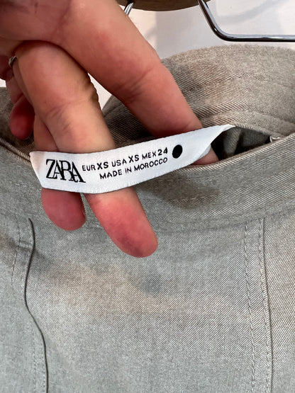 ZARA. Falda midi beige bolsillo T.xs