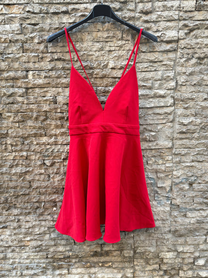 ZARA. Short red dress with brooch detail on the back. TS