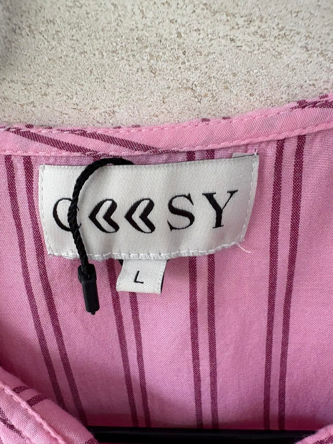 COOSY. Blusa rosa volantes mini