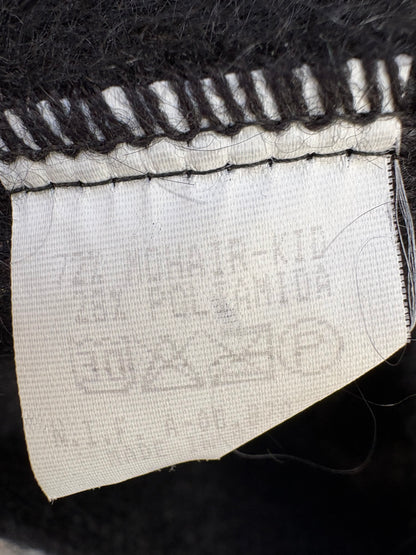 OTRAS. Chaqueta negra mohair pelito