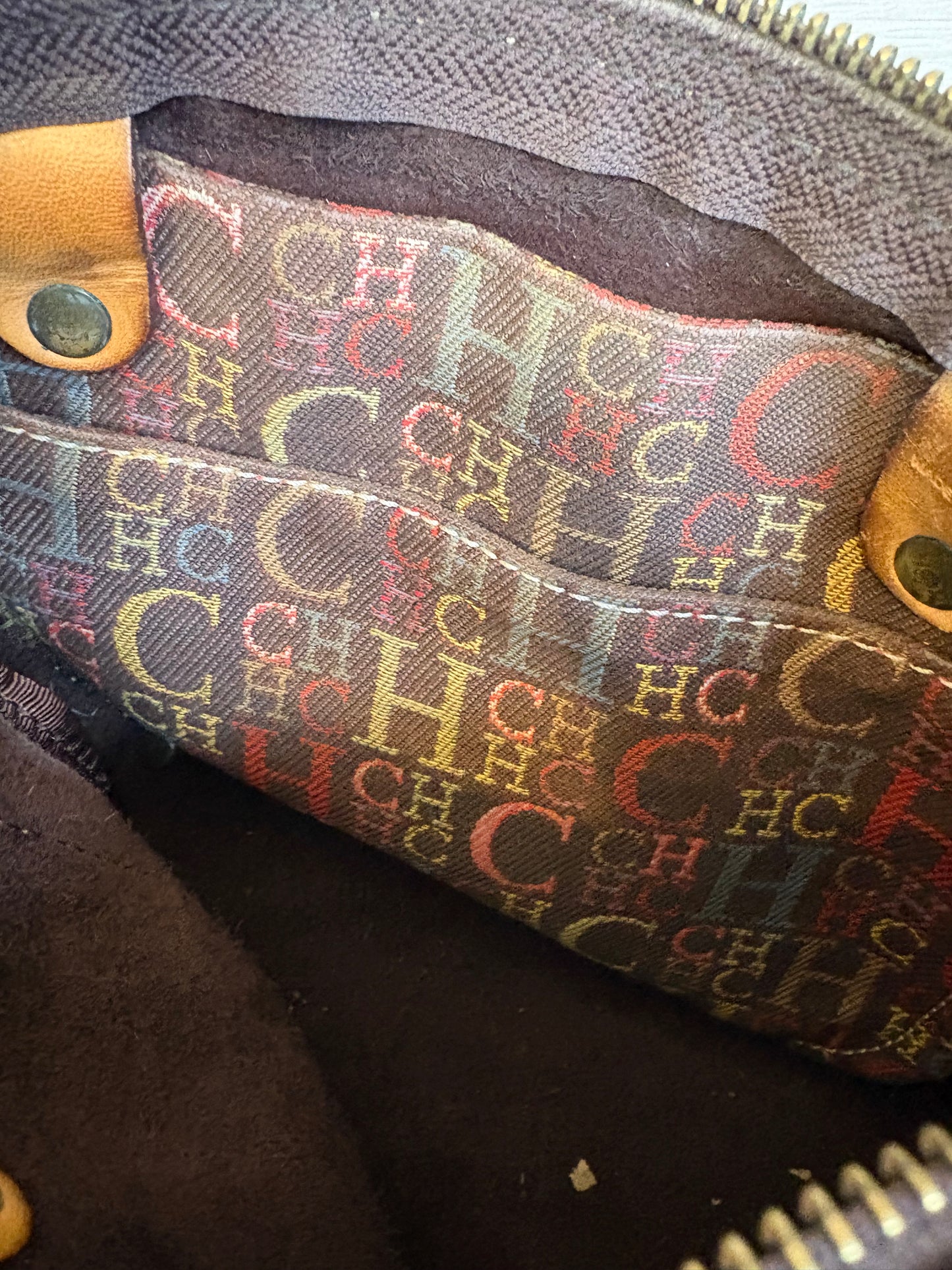 CAROLINA HERRERA. Bolso de mano marrón anagrama