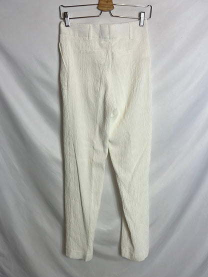 VICTORIA BECKHAM. Total look blanco textura T.36