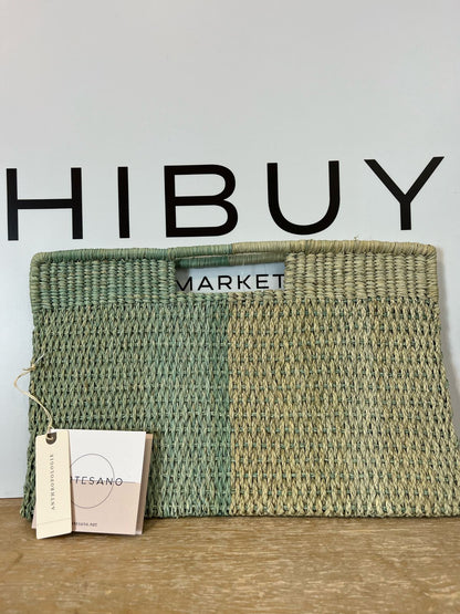 ANTHROPOLOGIE. Cartera de mano hecha a mano bicolor