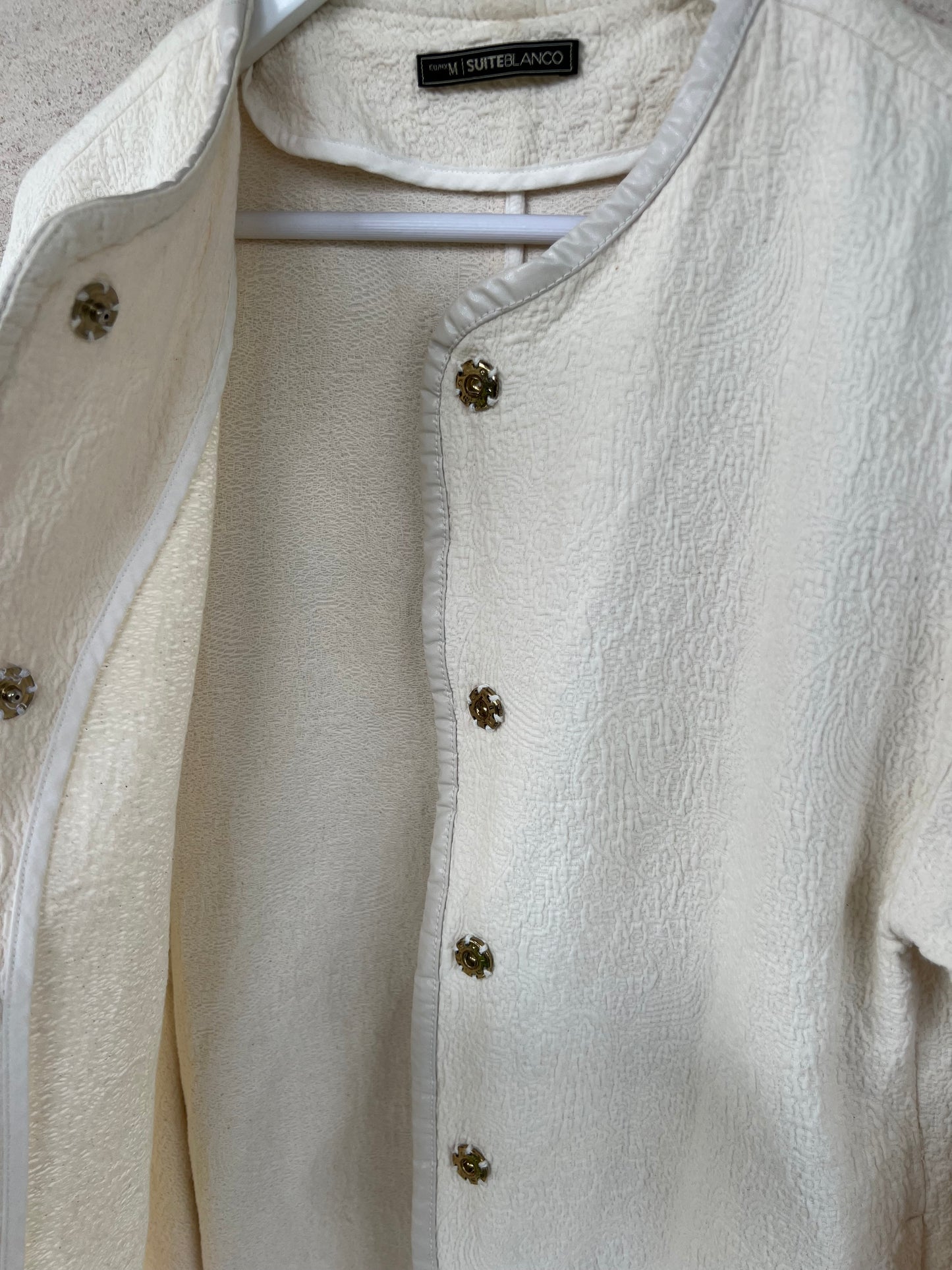 WHITE. White textured Tm jacket