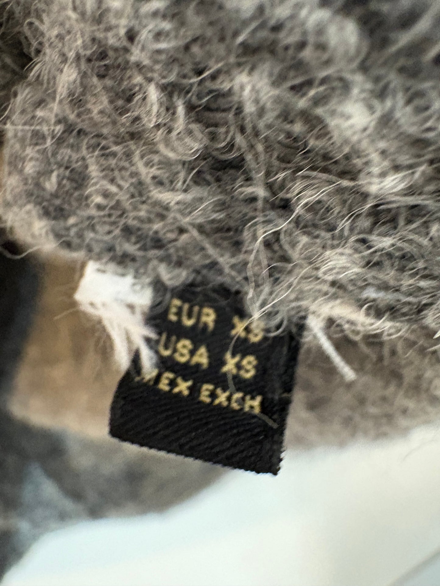 OTHERS. Long knit dress with neckline detail. TS