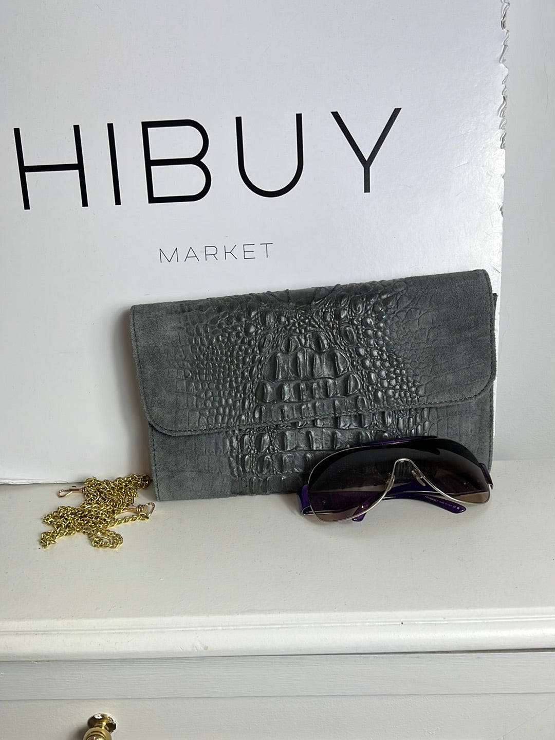 OTRAS. Bolso/cartera piel gris troquelada