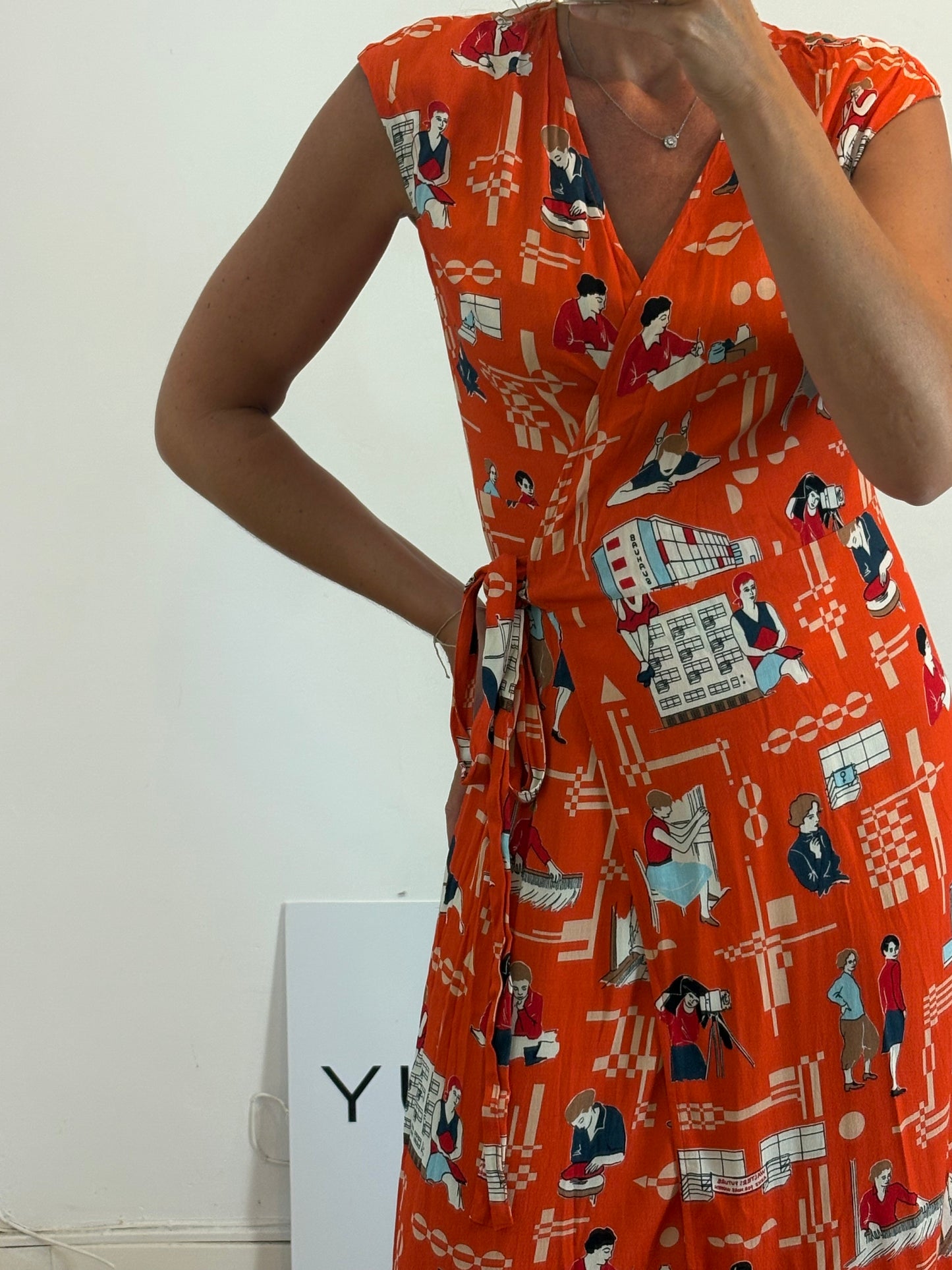 NICE THINGS. Orange dress with a patterned print, size 36