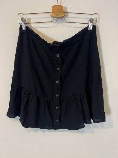 THAT OR THAT. Flowing black buttoned skirt. TL