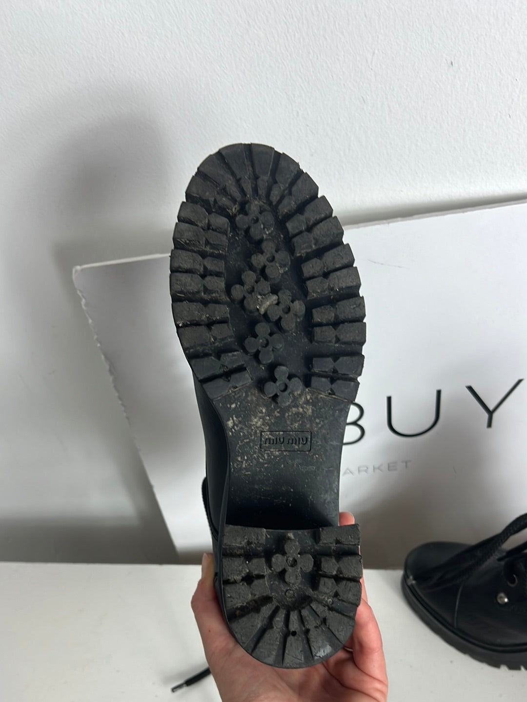 MIU MIU. Black lace-up heeled ankle boots. Size 39