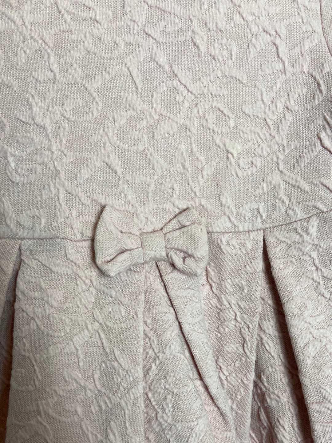 C&amp;A. Pink textured bow dress Size 6-9 months