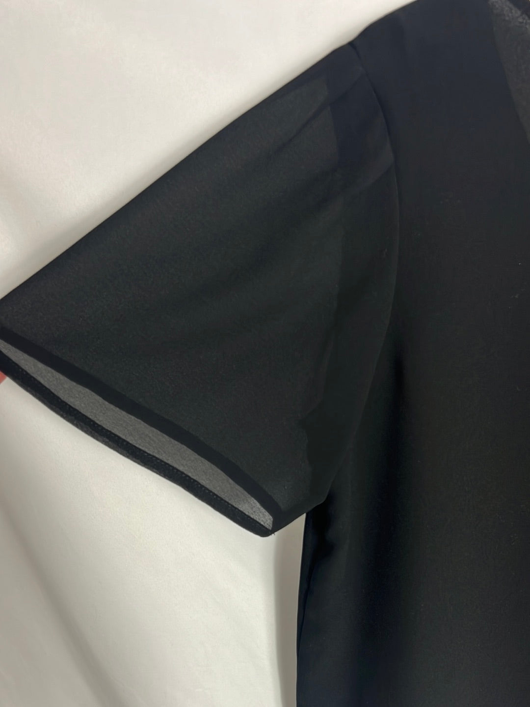 BIMANI. Black blouse with gold buttons. TM