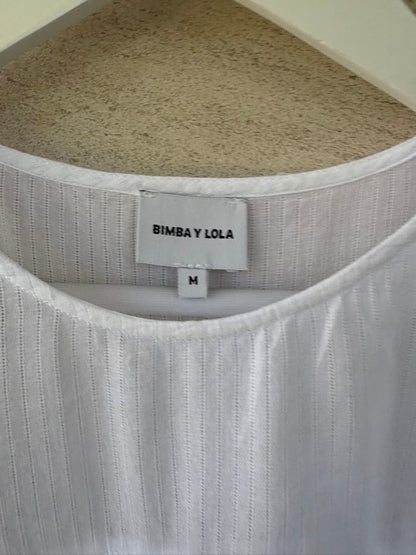 BIMBA Y LOLA. Blusa blanca volantes