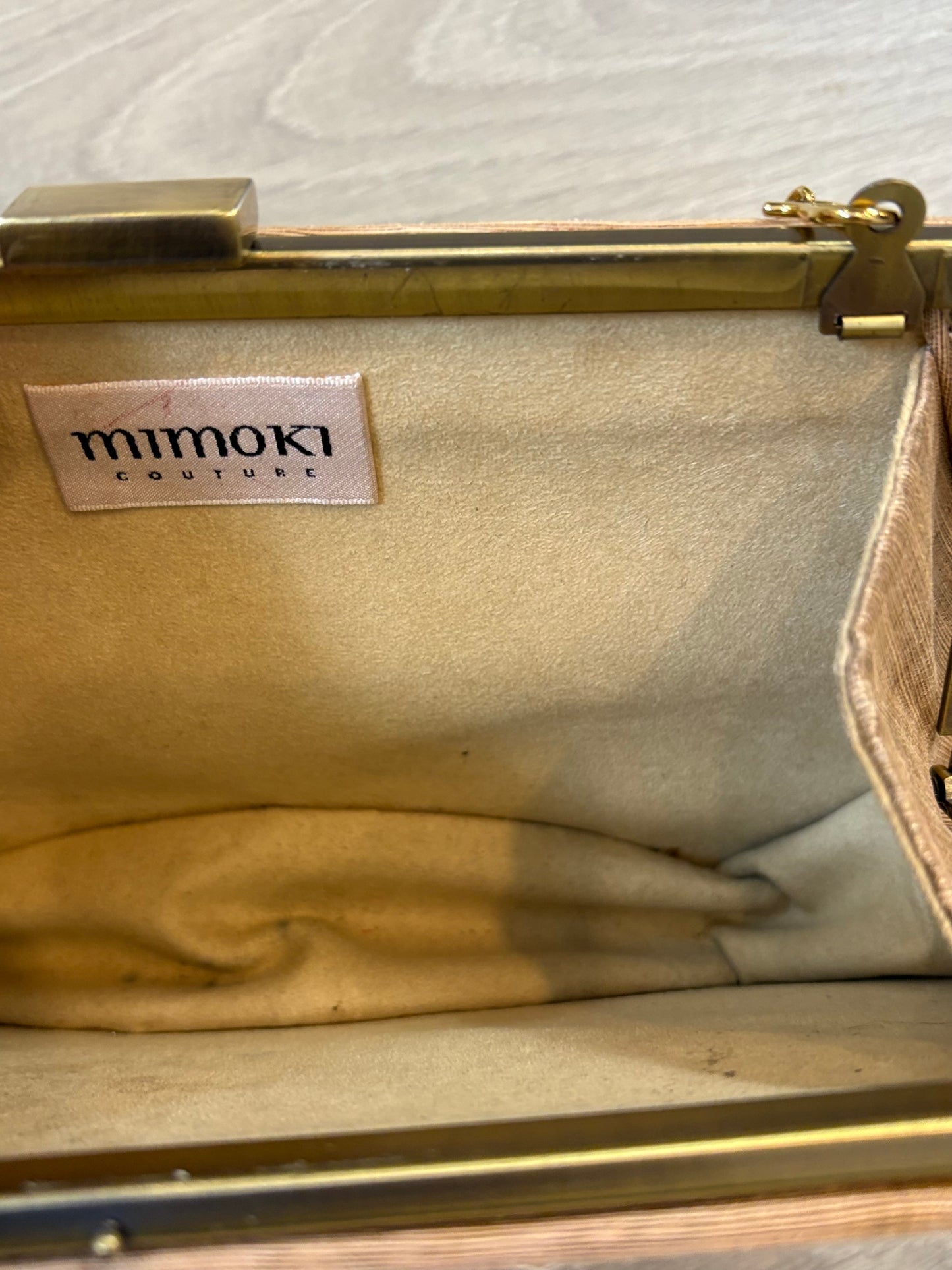 MIMOKI. Bolso beige textura