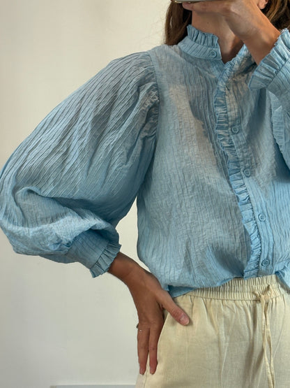 Blusa azul claro textura