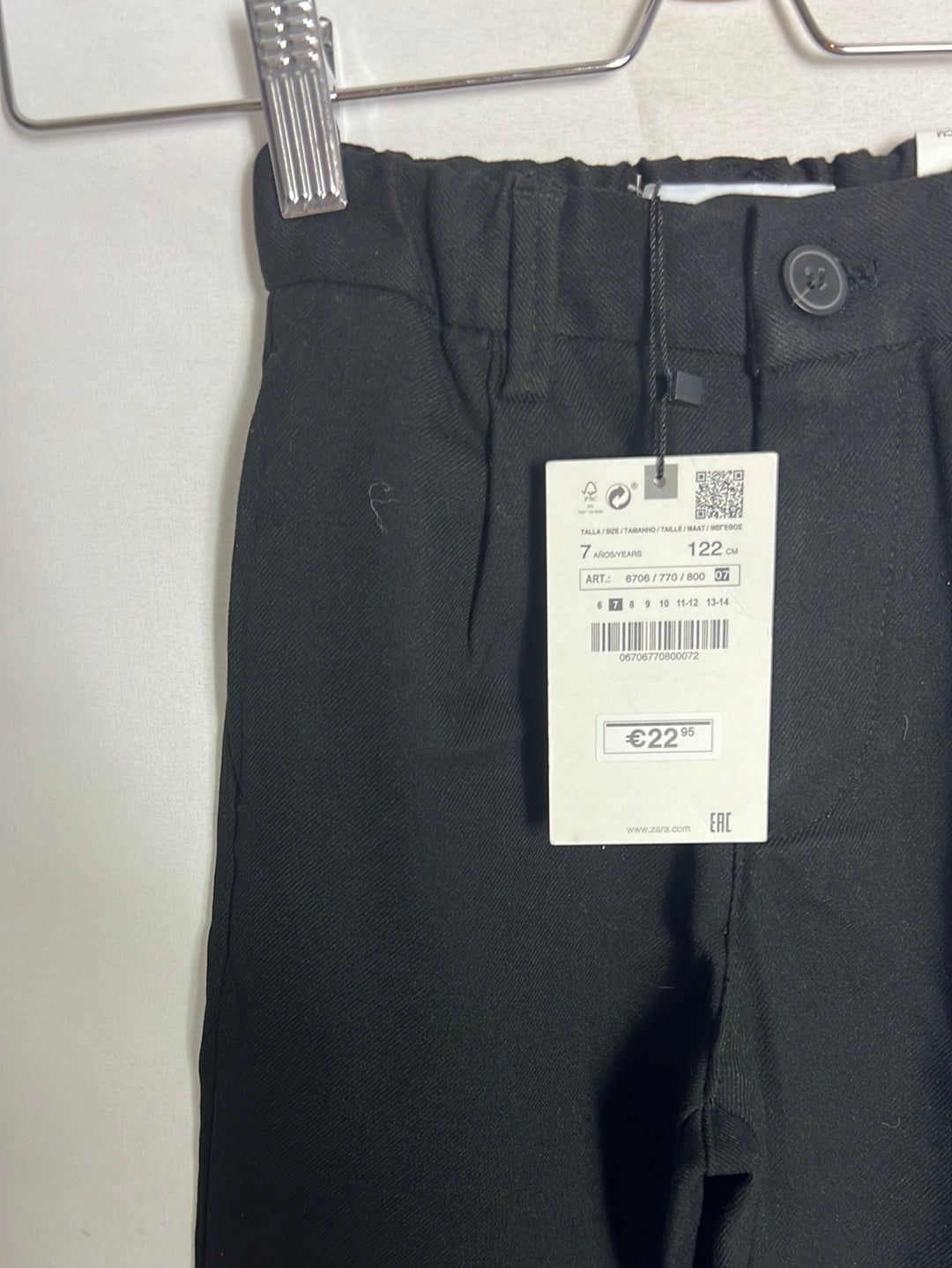 ZARA. Black chino-style fleece trousers. Size 7 years.