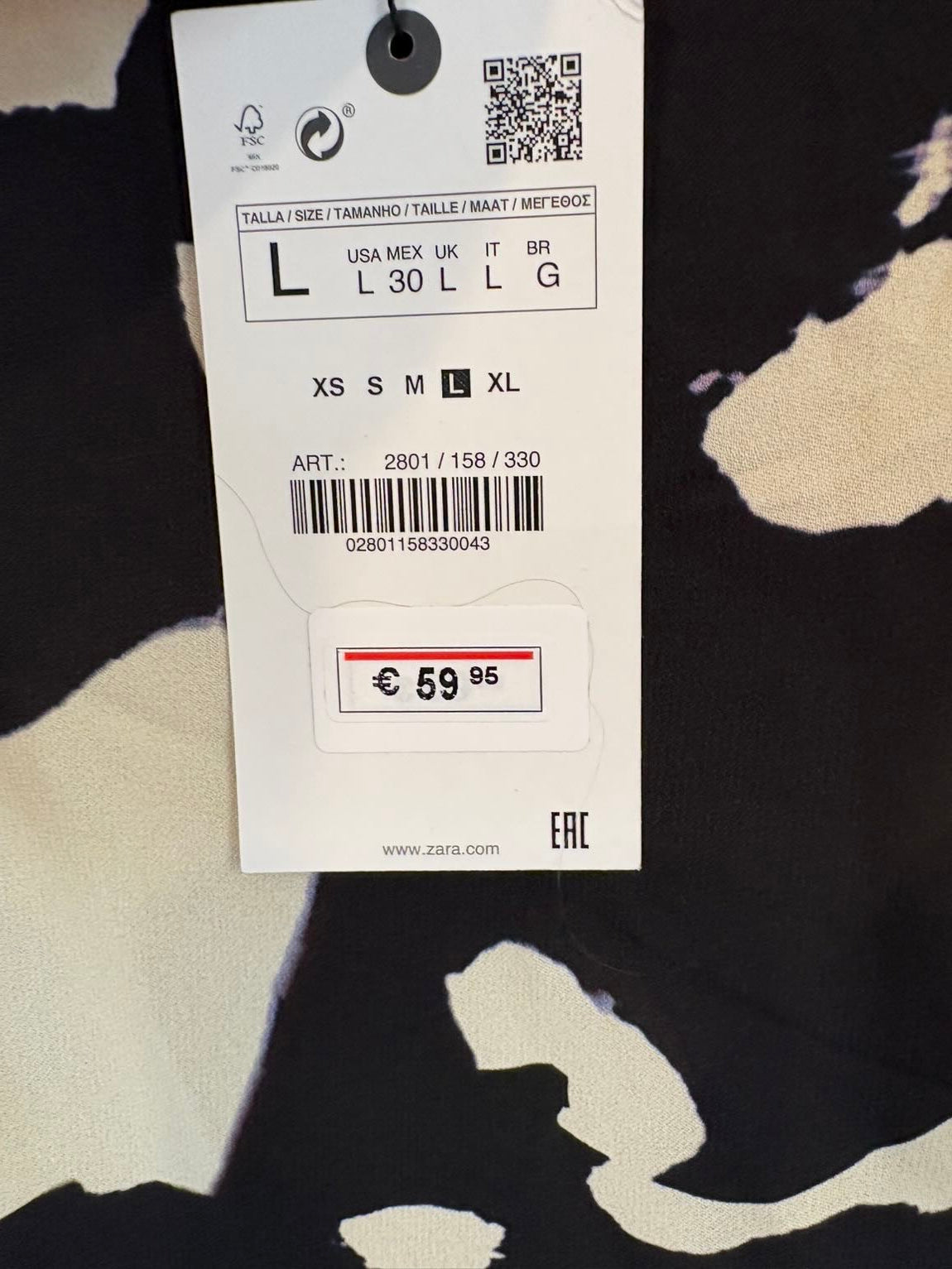 ZARA. Pantalón estampado efecto falda