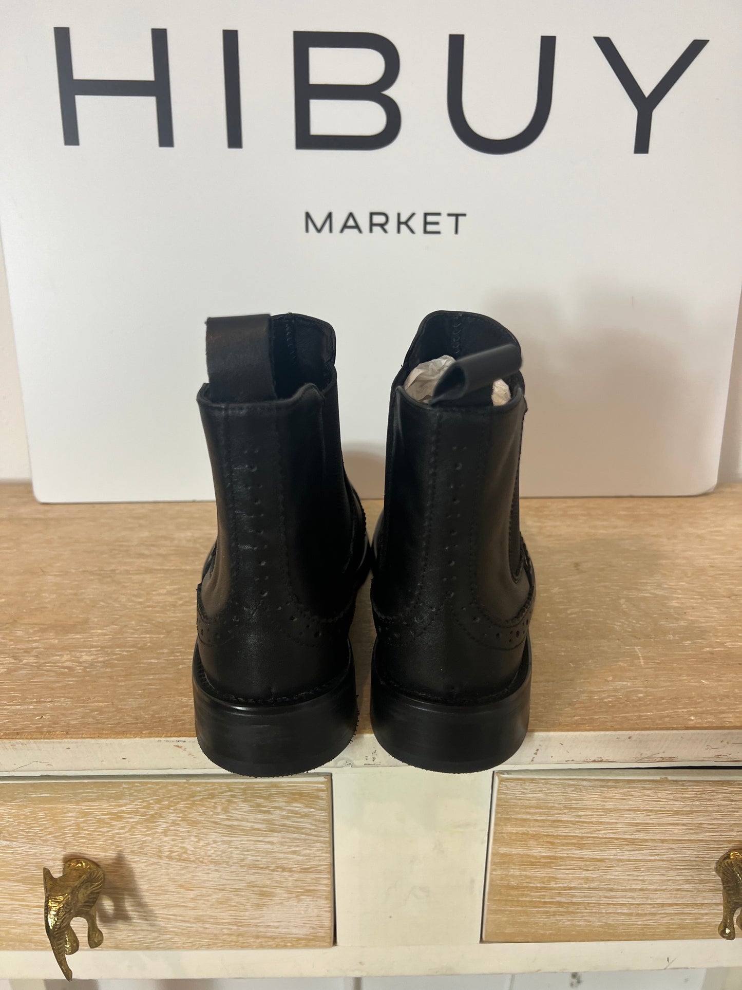 OTHER. Black ankle boots with die-cut details, size 38