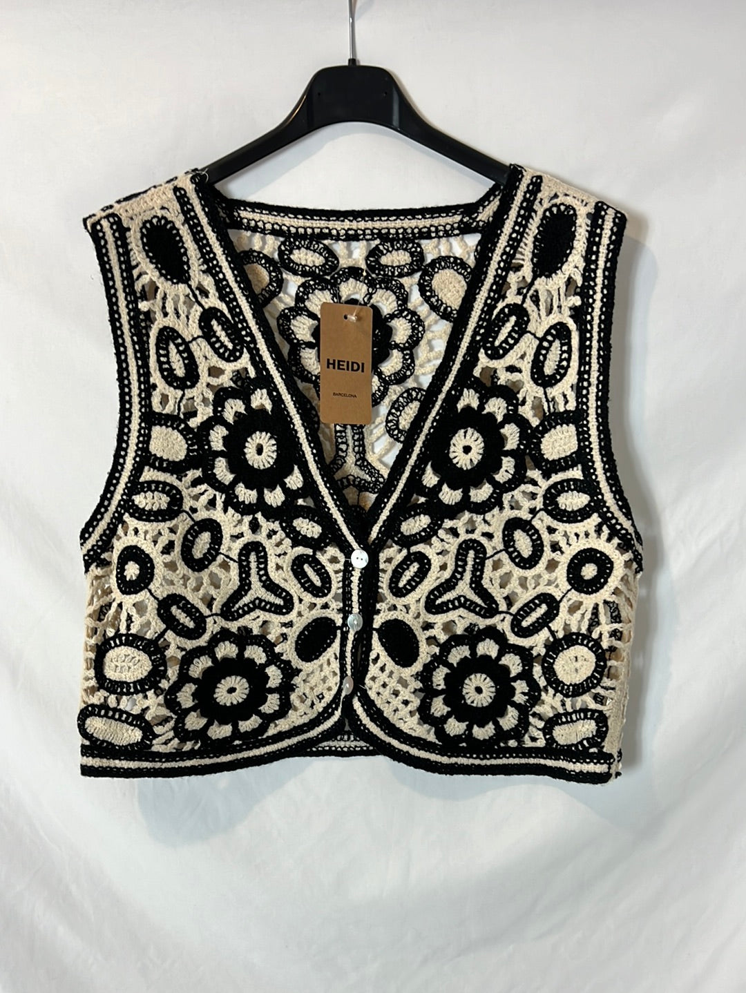 OTRAS. Chaleco bicolor troquelado. T S