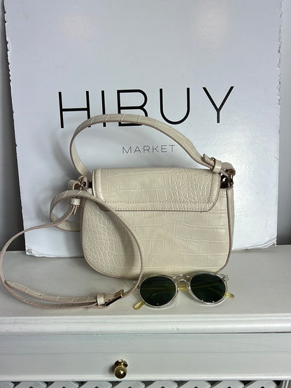 H&M. Bolso beige troquelado doble asa