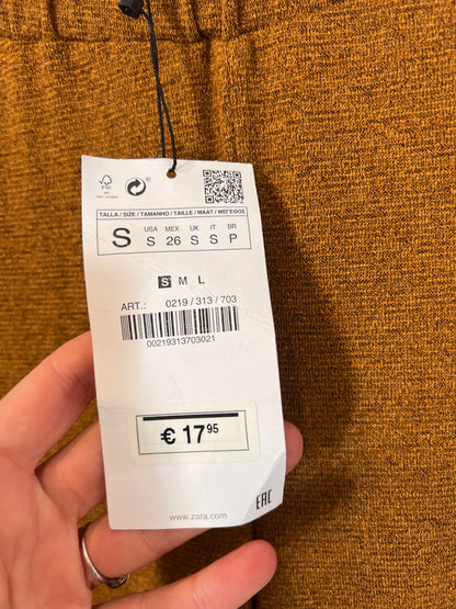 ZARA. Pantalón camel fluido jaspeado. T S