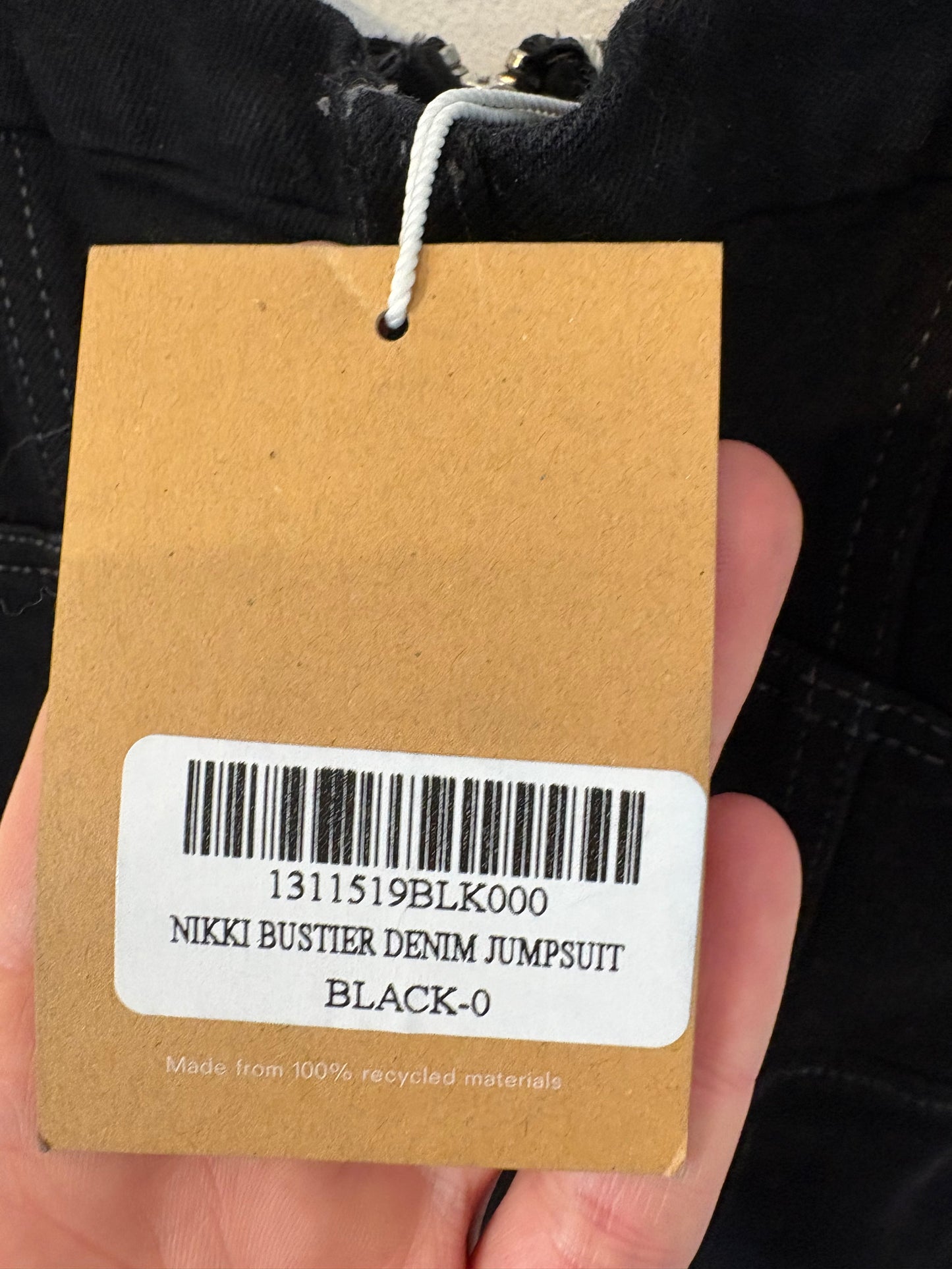 REFORMATION. Mono negro denim