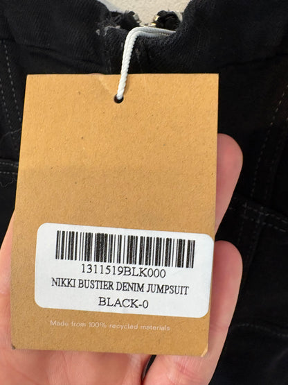 REFORMATION. Mono negro denim