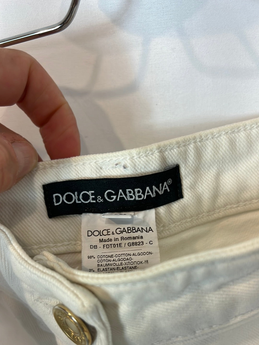 DOLCE&amp;GABBANA. White denim shorts with lace detail. Size 40