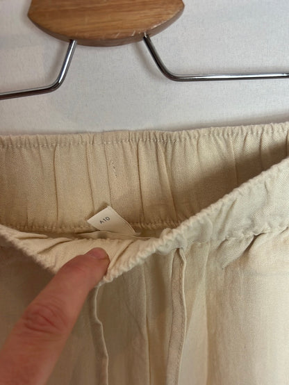 H&M. Pantalones beige efecto Lino. T XS