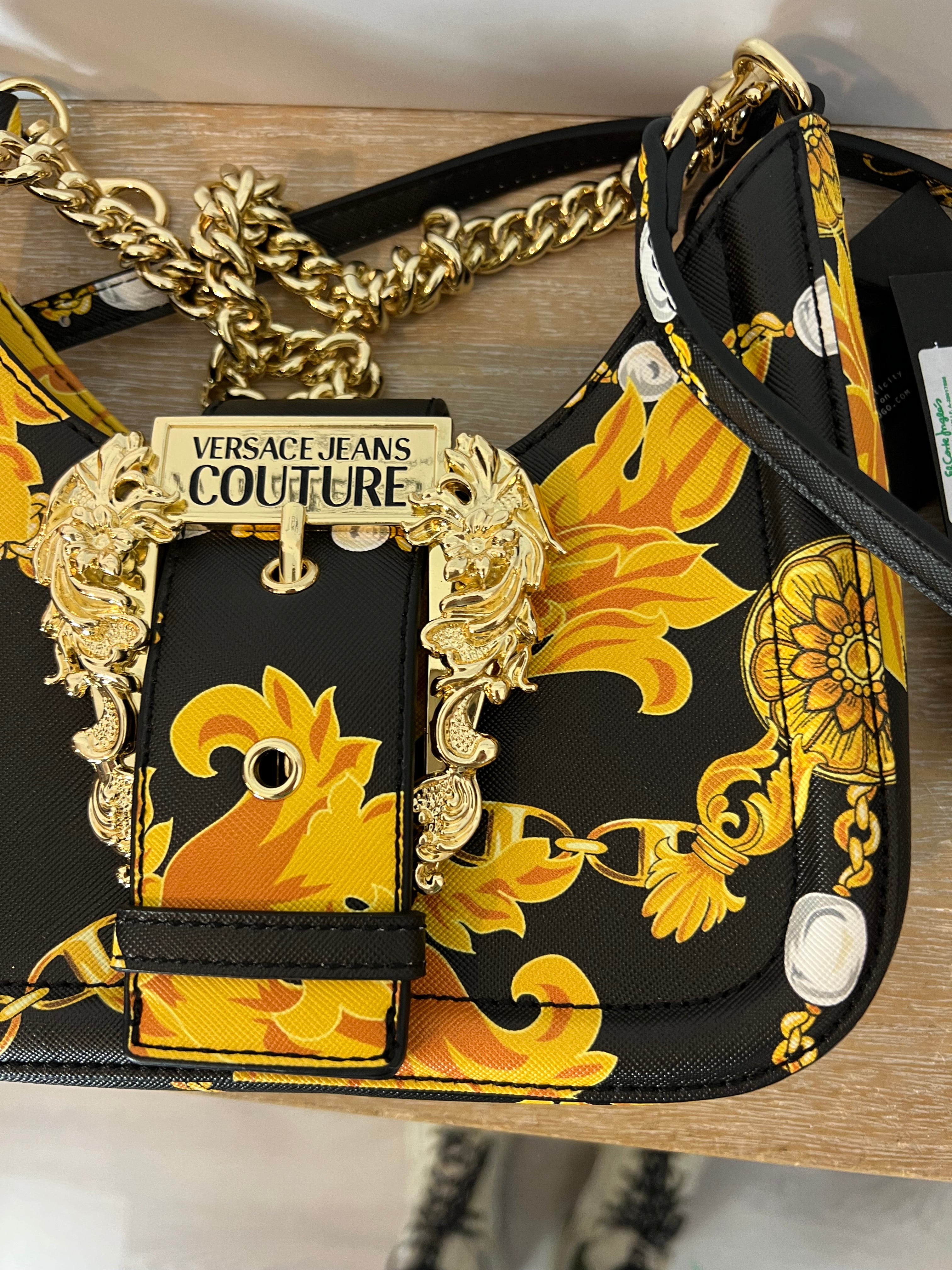VERSACE JEANS COUTURE. Double-handle bag and gold-tone buckle coin