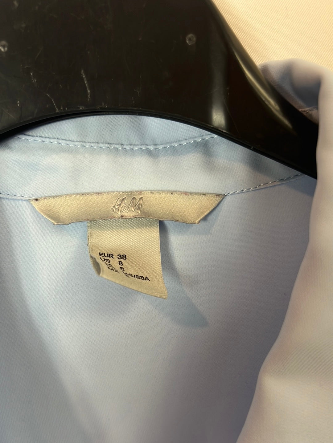 H&M. Blusa azul sin mangas T.38