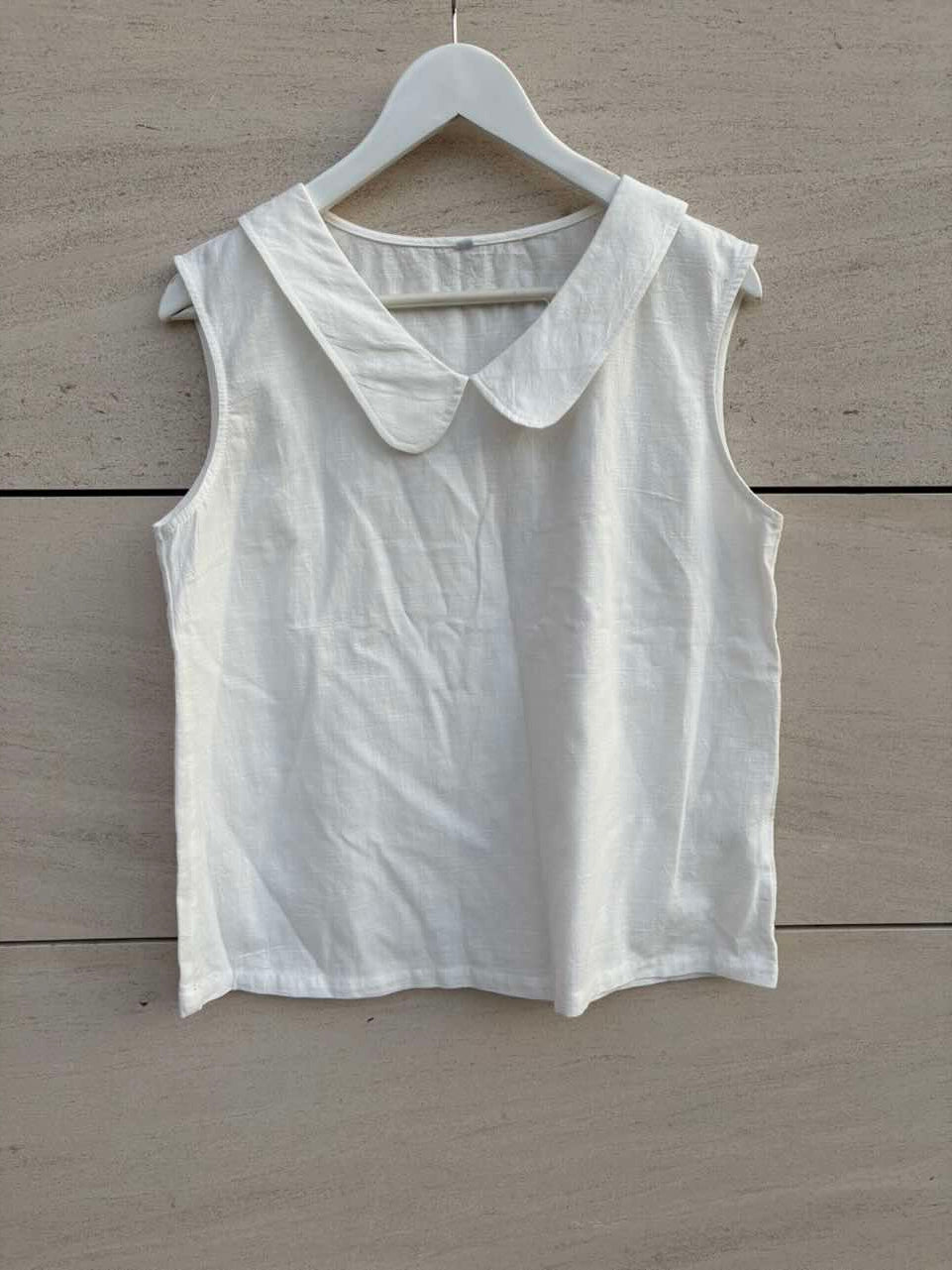 Top algodón detalle cuello