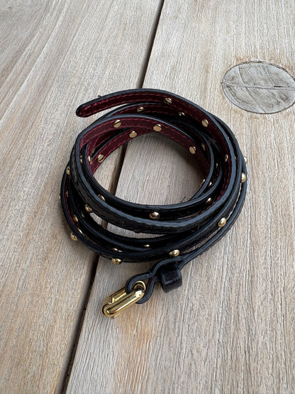 BIMBA Y LOLA. Cinturón fino tachuelas piel. TU