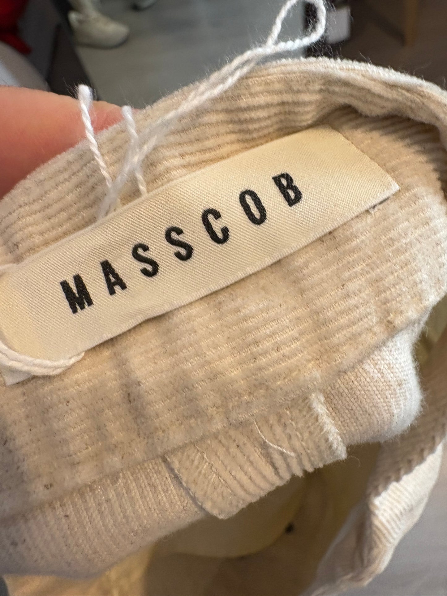 MASSCOB. Falda midi beige jaspeada