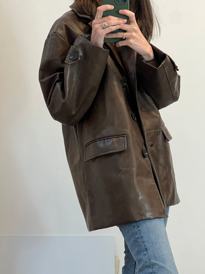 SFERA. Abrigo marrón efecto piel