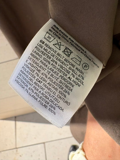 H&M. Gabardina larga verde oscuro