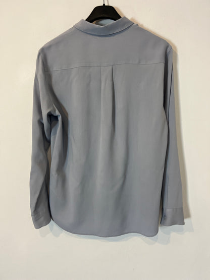 UNIQLO. Blusa fluida azul claro T XS