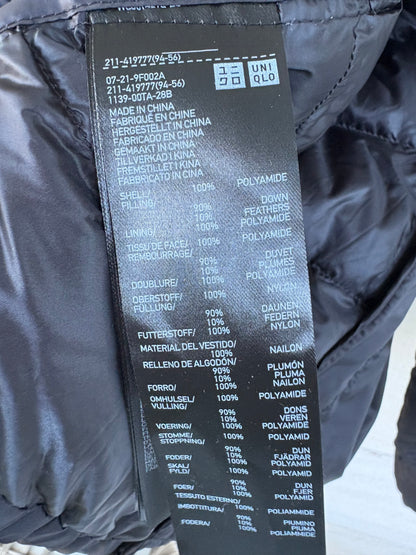UNIQLO. Ultralight dark blue down jacket with hood. TM