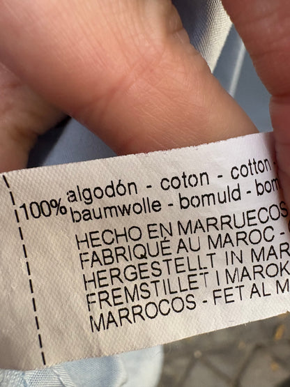 ZARA. Blusa azul volante