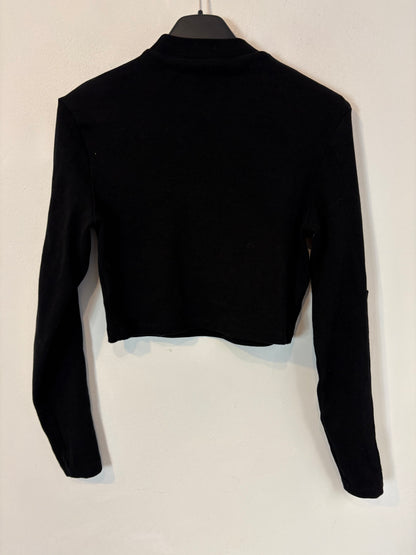 THE DROP. Top negro canalé detalle mangas