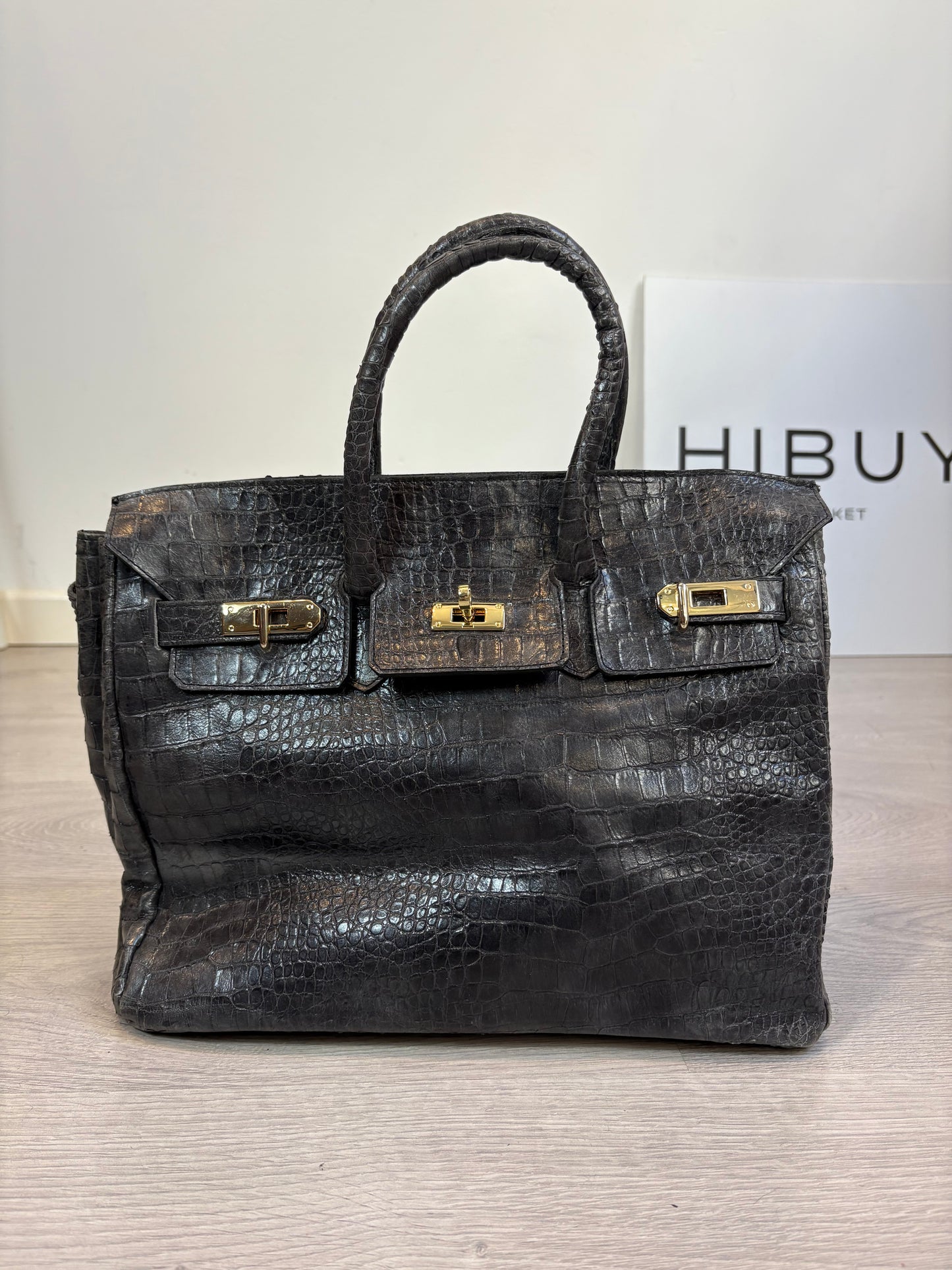 OTRAS. Bolso de mano gris piel